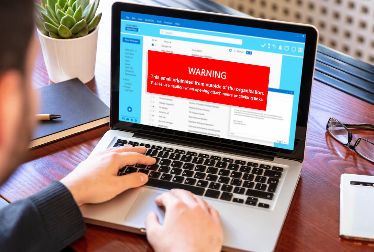Infographic illustrating strategies to safeguard businesses against phishing attacks, featuring tips and preventive measures.